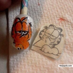 I painted this artificial nail to wear