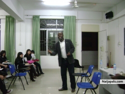 GIVING A LECTURE IN THE UNIVERSITY, CHINA.