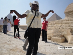 holding 2 pyramands