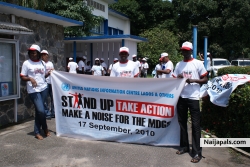 ken in stand up and take action rally