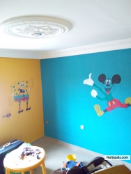 A BABY'S ROOM DESIGN WITH HIS FAVOURITE CARTOONS