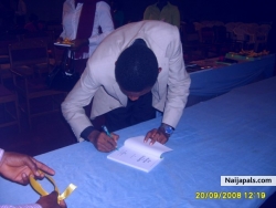 Autographing my second book in  a summit