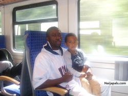 papa and son driving with train