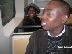 me and ma babysister n babysitter (from Tolu Odungunwa) lol on da train