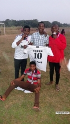 posssing with department team mates at FUNAI