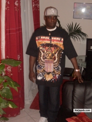 MY BROTHER IN HIS LIVING ROOM RELAXING