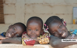 one of the Benin children coming to play >>