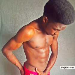 samwhizzy Nigerian singer showing off his six packs