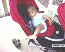 darius trying to climb out of his stroller at 10months now
