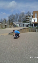 JEFFREY MAKING A MOVE ON HIS SKATEBOARD