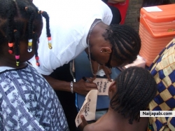 SpiritMan signing autographs for kids