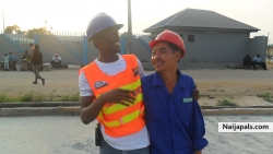 ME AND MY CHINESE FRIEND AT THE SITE