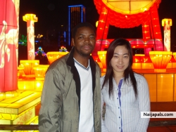 peter and a chinese girl during chinese new year celebration.