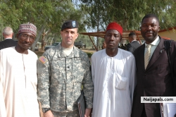My picture with a Us army Officer,Col T.Cook and my Colleague in Jaji