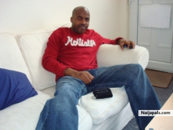AT HOME WATCHING FOOTBALL
