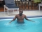 uche inside the pool