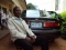 GEORGE POSING WITH TOYOTA CAMRY