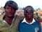 Myself (James) on cap with a friend (Philemon Adang) dark goggles (Safety glasses) in a Nigerian Gheto....