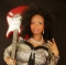 Kimwonder is a Songwriter, Singer, Musician, and Entertainer who started her musical career in England, and is a Record-Selling Artist in the U.K & U.S.She recently started a dance/musical band and is now making waves not just outside the continent, but right home in Africa.