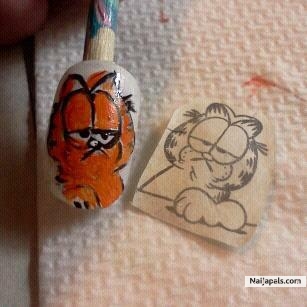 I painted this artificial nail to wear - click for next photo
