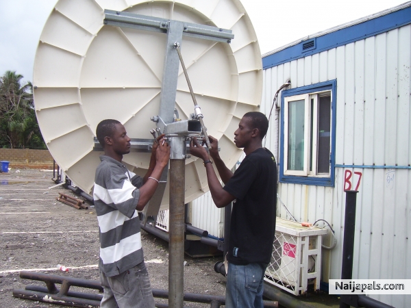 fixing the VSAT dish... - click for next photo