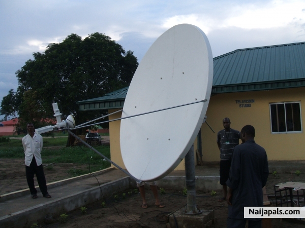 working on a internet satallite dish - click for next photo