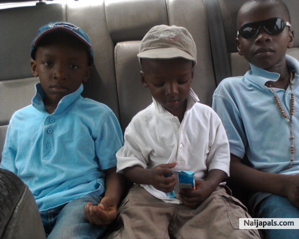 favour and Divine Nkemdirim(my nephews)and ik house help - click for next photo