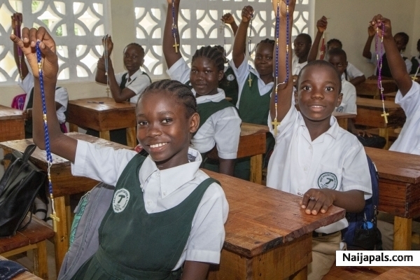 attending church in school classroom. - click for next photo