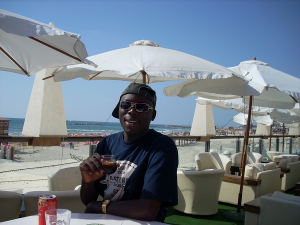chilling by the mediterranean sea beach - click for next photo