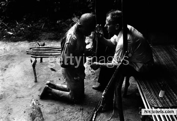 A priest blesses a Biafran man during the civil war in Biafra (now part of Nigeria), 1969 - click for next photo