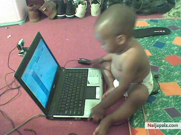 that my boy working on his loptop - click for next photo