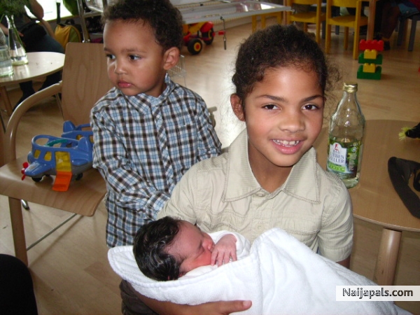 my kids with the newborn melissa chioma - click for next photo