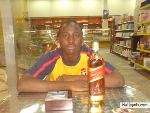 popping a bottle of Red Label - click for next photo