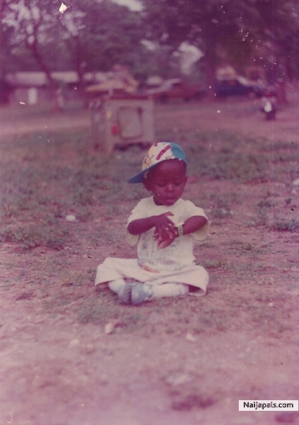 Lil Jossy havin fun wit his watch - click for next photo