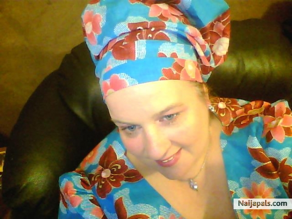 Dressed in my ankara... was not easy to tie my gele - click for next photo
