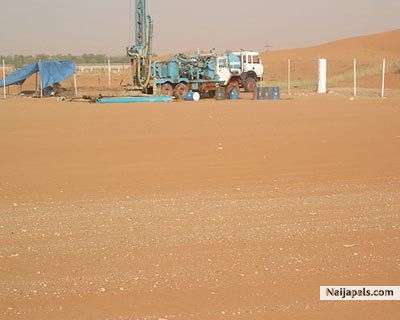 Mohamed Dekkak Chairman of Adgeco Group and Bassel Fotayeh Director of Rawabi Fayfa on Site Visit Preparation - click for next photo