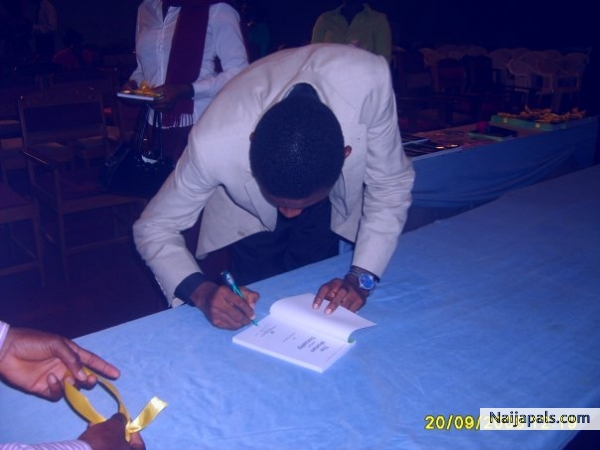 Autographing my second book in a summit - click for next photo