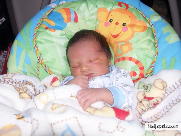 My son Elijah sleeping peacefully. Love him to death... - click for next photo