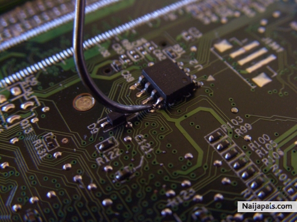 seeing is believing, this is an internal view of the mother board and the security chip that holds the password and other vital information of the - click for next photo