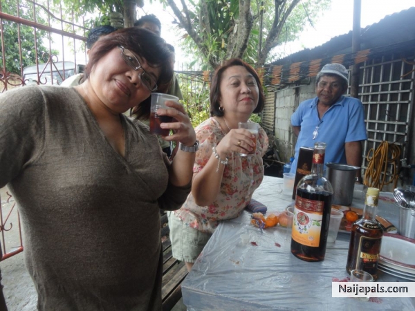 xmas bonding with my family...red winee.. cheersss - click for next photo