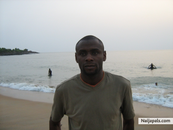 at the beach in freetown - click for next photo