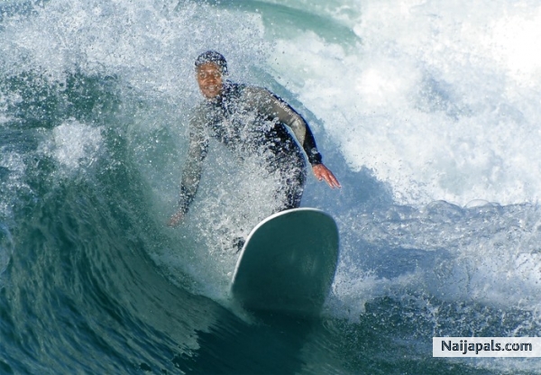Surfing on a Sunny day. - click for next photo