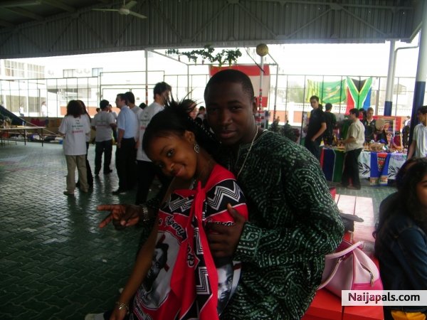 ma babee gurl and i chilling out in our native cloths..... - click for next photo