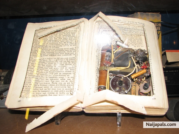 my talking book. Paddy mi dont tell me this is giving birth to other books [ !!] I g0 run!! ! - click for next photo