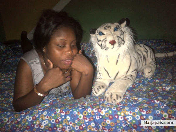 on bed alone in my rum - click for next photo