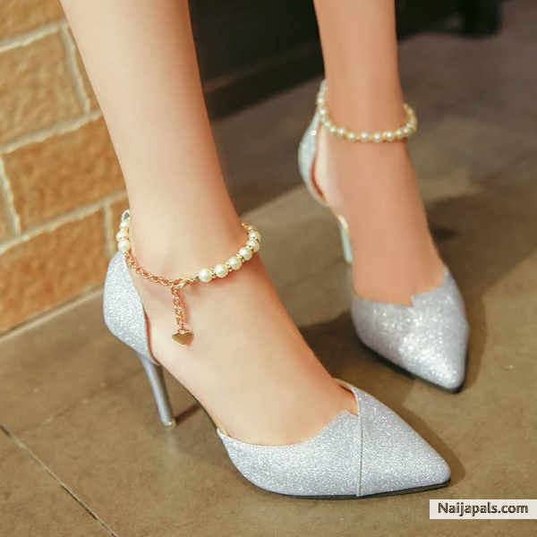Silver ankle pearl heel up for grabs. Sizes 37 & 40 available. Limited stock! Call or whatsapp: 08187735097 - click for next photo
