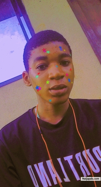 Nigerian young upcoming artist, rapper, singer and a song writter - click for next photo