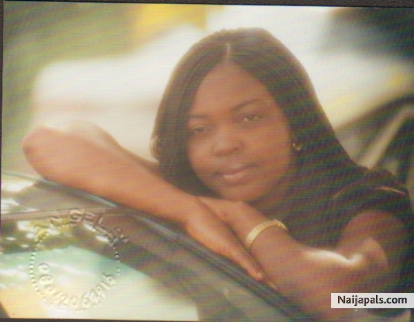 Eve leaned on a car - click for next photo