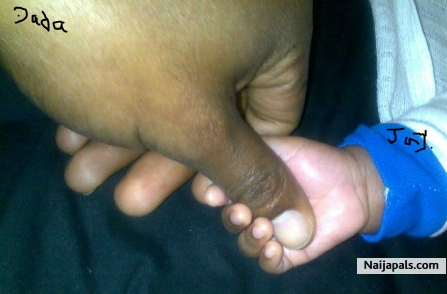 This tiny hand will be filled with love - click for next photo