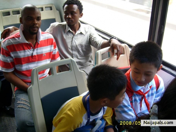 Broda and I on Chinese city bus. - click for next photo